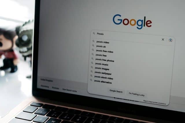 Laptop showing Google search results for a SEO enhanced business website design.